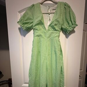 Green checkered seersucker jumpsuit by Charlie Holiday